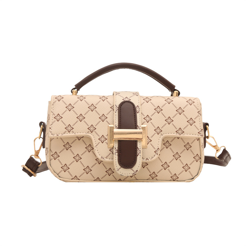 Bagos de color retro retro de estilo extranjero mujeres 2025 nuevo nicho diseño de empalme bolso pequeño bolso portátil de viaje