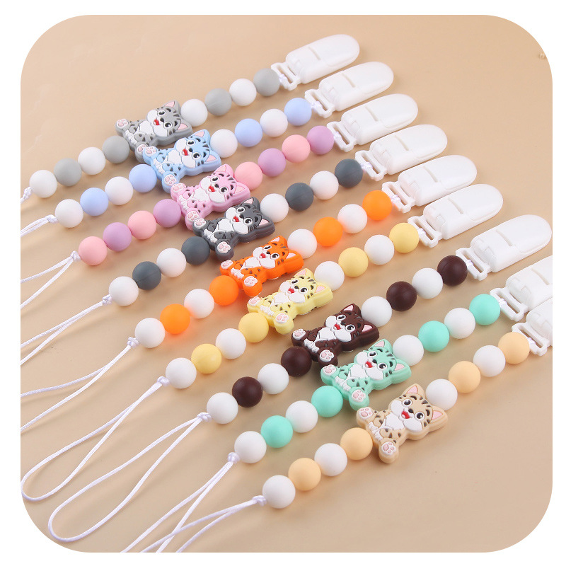 Amazon nuevo clip de pezón de plástico para bebés animados animales gatos calmar silicona bebé molar cadena de pezón