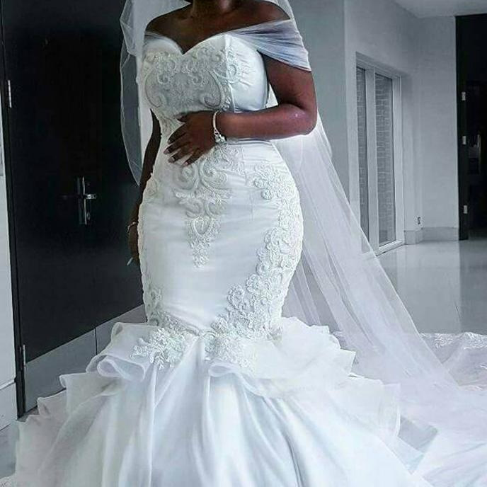 2026 Summer New African Mermaid Off-Shoulder Vintage Lace Bridal Gown with Long Train 2026 Summer New African Mermaid Off-Shoulder Vintage Lace Bridal Gown with Long Train