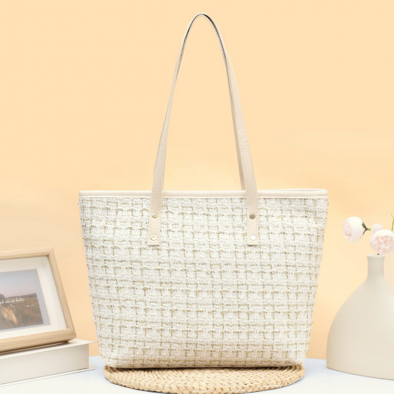 2025 nuevo bolso de cubo de tela de tela de mano de mujer alta calidad bolso de hombro de moda temperamento universal nicho bolso de mochila