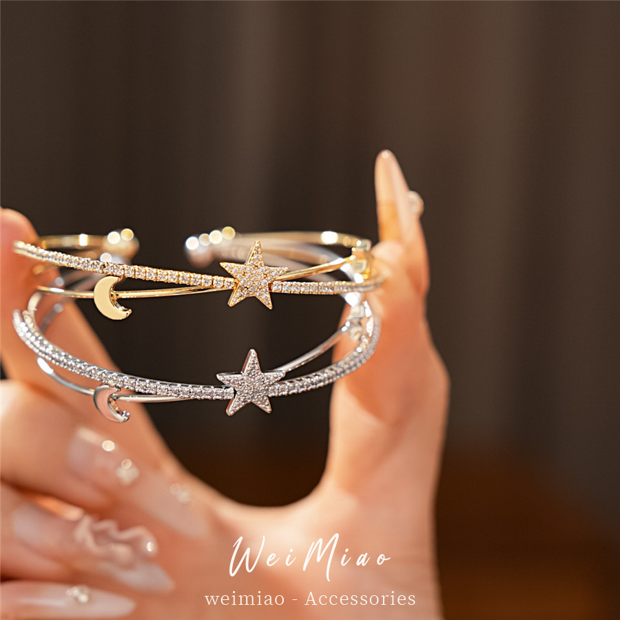 El oro real, la estrella de piedra, la luna, la doble abertura cruzada, la pulsera de personalidad, la pulsera de nicho, el lujo ligero