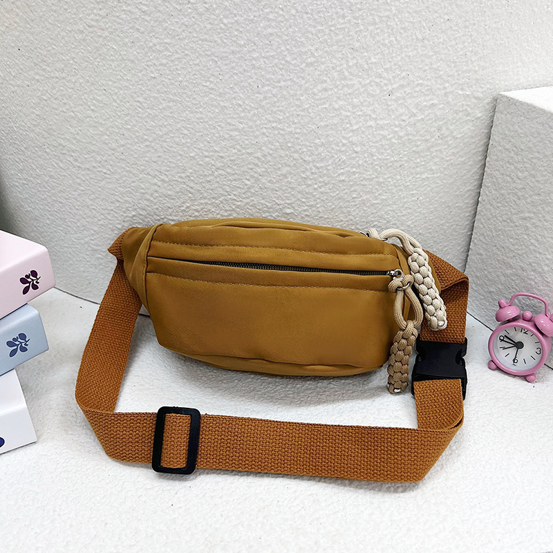 Lindo bolso de pecho de moda de color sólido para niños nuevo 2024 textura de estilo occidental gran capacidad snack bandolera con bolso de pecho