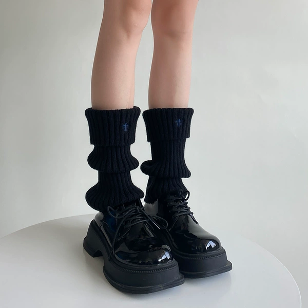Black-embroidered model (blue label)