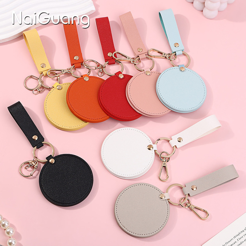 Round Pu Leather Makeup Mirror Portable Rotating Leather Small Mirror Pendant Portable Keychain Mirror with Logo Imprint Round Pu Leather Makeup Mirror Portable Rotating Leather Small Mirror Pendant Portable Keychain Mirror with Logo Imprint