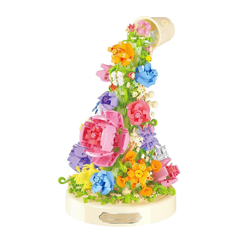 積み木の花がバラのオルゴールを飾っています。|undefined