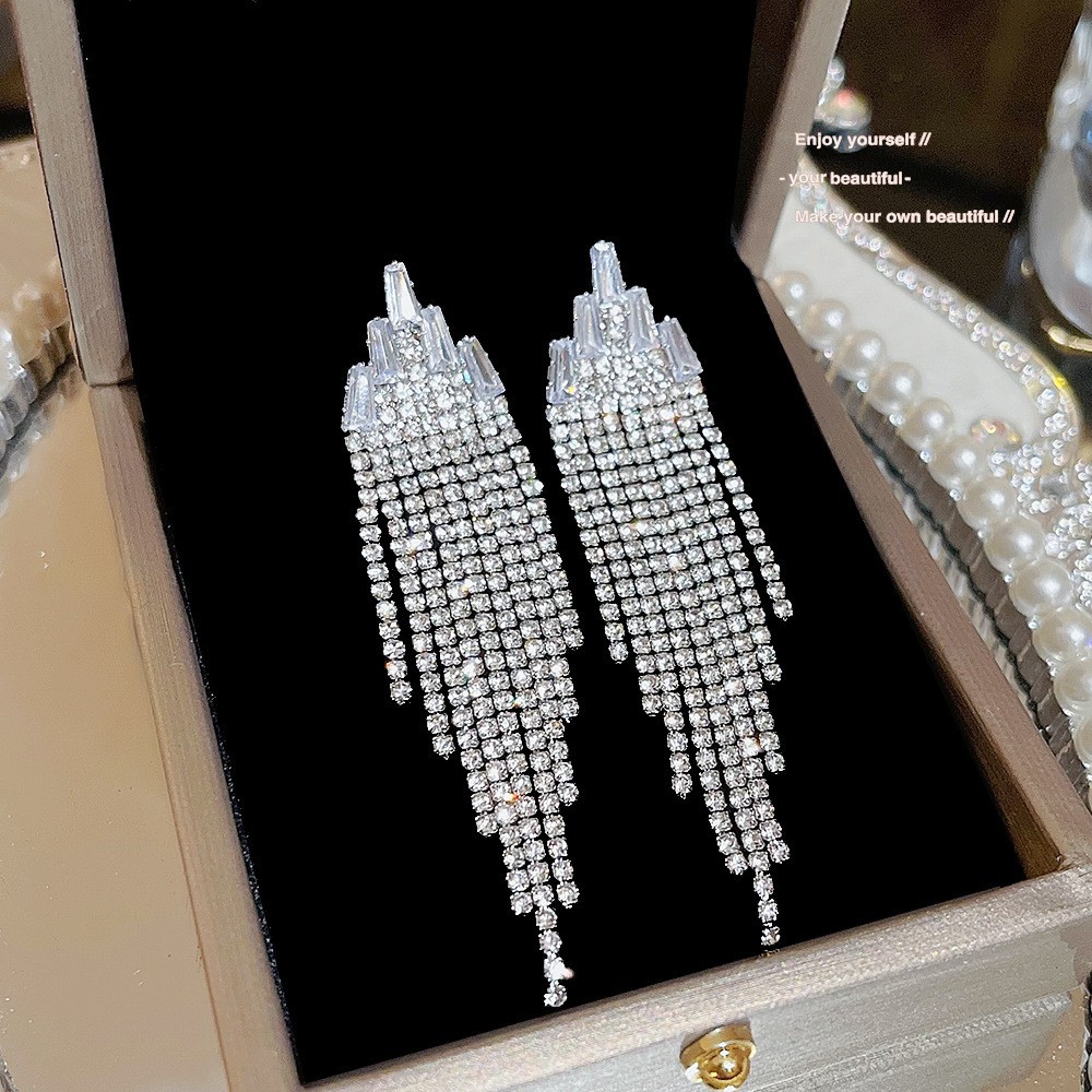 S925 aguja de plata elegante borla pendientes de alta gama simple cara de adelgazamiento pendientes de todo fósforo estilo coreano nuevos pendientes de moda al por mayor