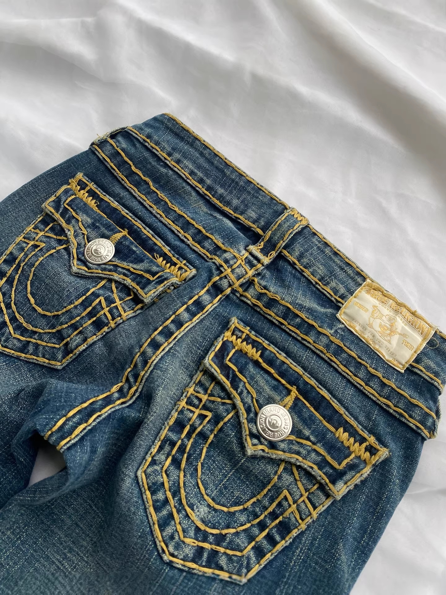 Retro tikməli aşağı bel slim fit klot cins şalvar
