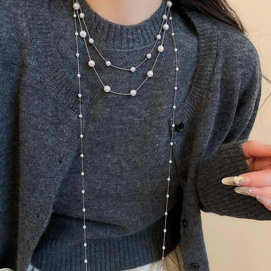 不規則な長いタイプの真珠のネックレスのフランス式の軽い豪華な気質のセーターのチェーンの小さい大衆のシンプルで高級感の項は卸売りの女性を飾ります。