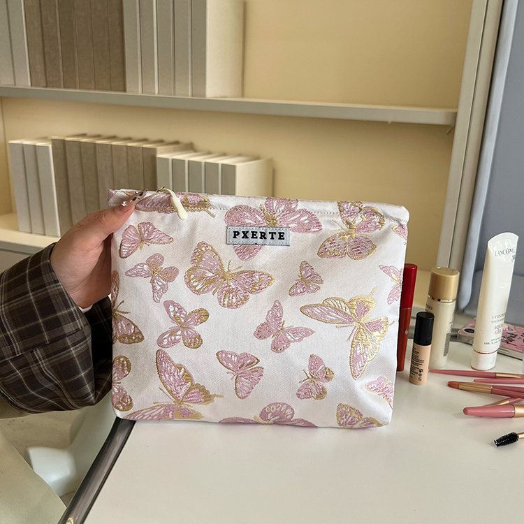 Bolsa de maquillaje de mariposa transfronteriza pequeña bolsa fresca portátil de cuidado de la piel bolsa de almacenamiento bolsa de lavado de viaje bolsa de lona bolsa de mano