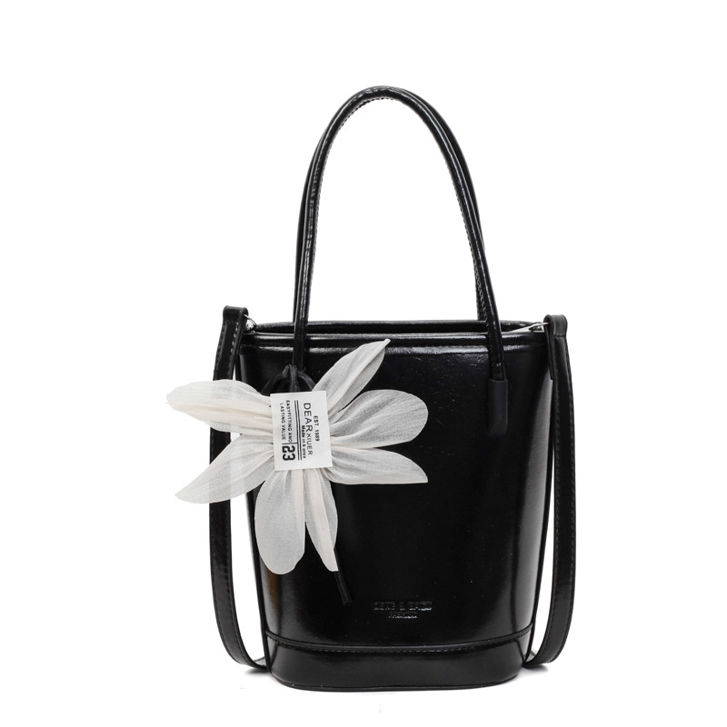 Bolso de moda personalizado bolso de cubo de textura de color sólido 2025 nuevo bolso de hombro de color sólido casual bolso de mensajero de cercanías