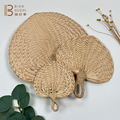 Rustic-style natural palm-leaf woven fan for summer cooling and mosquito repellent—large, handcrafted, and perfect for a gentle breeze.