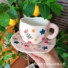 Розовый фон, цветочный узор — чашка и блюдце