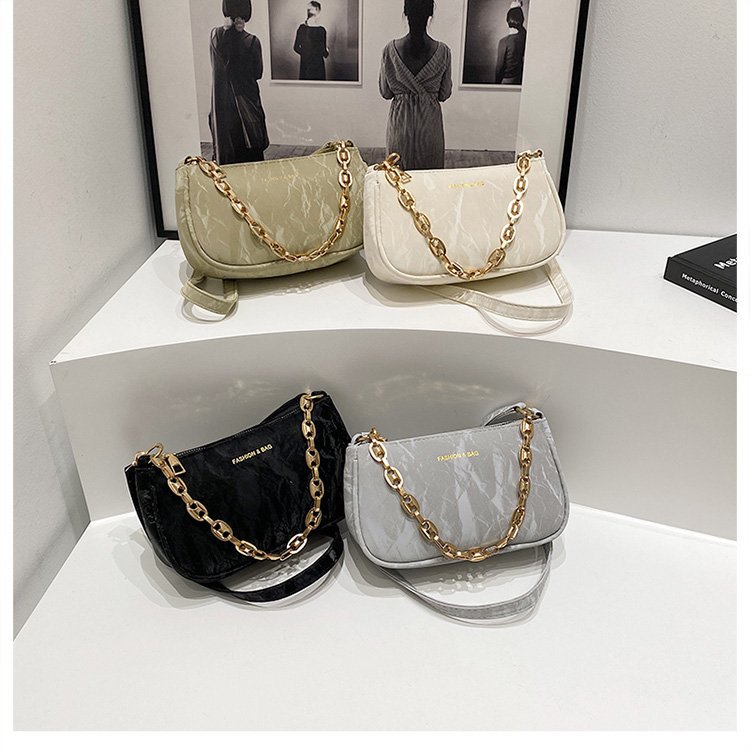 Popular 2024 nuevo viaje de invierno mochila de hombro de textura de moda mochila de nicho de diseño de cadena bolso debajo de la axila