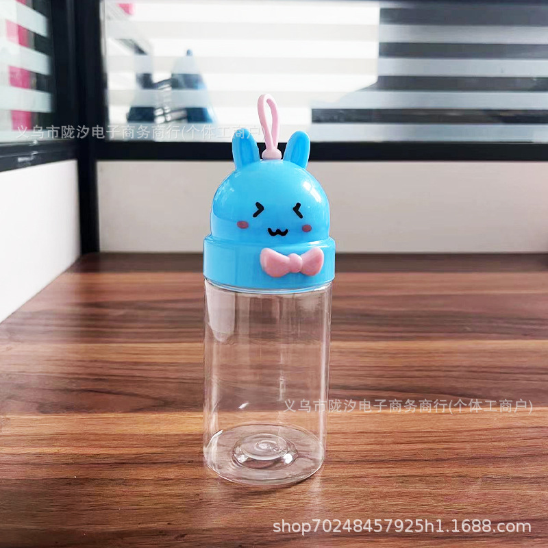 Lindo en forma especial de dibujos animados lindo conejo botella de embalaje de plástico PET grado alimenticio caramelo de barro soluble en frijol sellado fábrica tarro lote