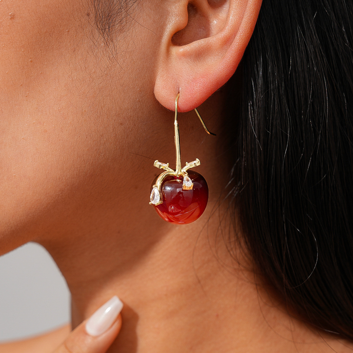 Europa y América resina zircon arco manzana gancho de auriculares de Año Nuevo feliz dulce aretes de moda nicho alta sensación de auriculares