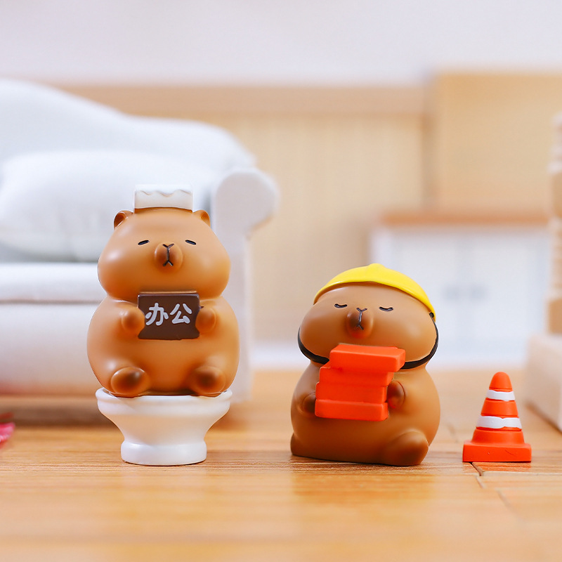 アルバイトの人はデスクトップに萌えて面白いです。かわいいカピバラのアルバイトの豚のブラインドケースの子供の祝日のプレゼントを代行します。