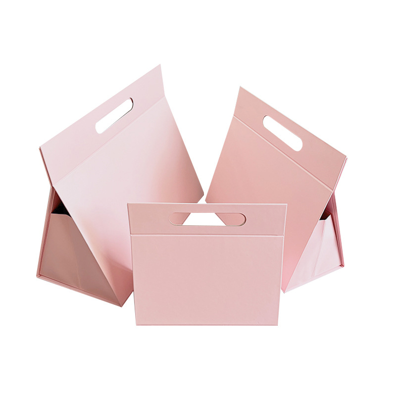 Caja de regalo plegable integrada en stock Caja de regalo plegable triangular rosa blanco negro