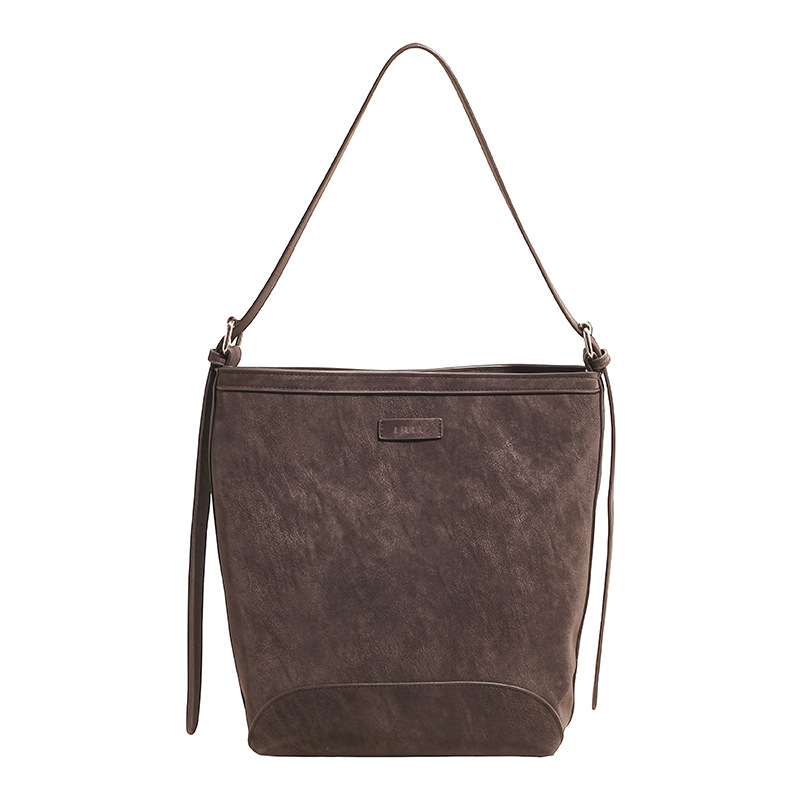 2025 nuevo bolso de brazo de viaje universal bolso de viaje de viaje de mujer simple retro mochila de hombro bolso de cubo