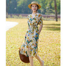 文艺棉麻女装2025夏季新款女短袖苎麻连衣裙花色圆领宽松中长裙