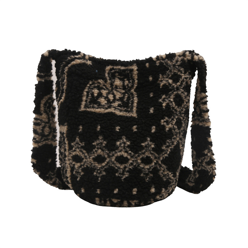 La versión coreana de otoño y invierno del nuevo material de lana de gran capacidad de la bolsa de mujer de viaje de viento perezoso de un solo hombro inclinado de la moda