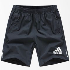 運動レジャー半ズボン男性は夏に氷糸速乾五分ズボンを着てゆったりとした大きいサイズのランニングフィットネスパンツを着ます。