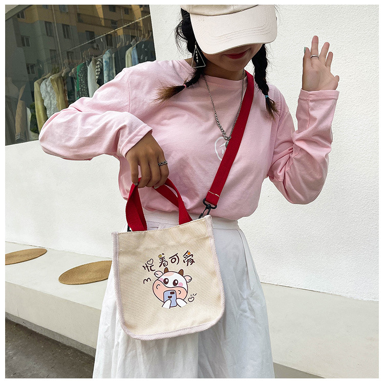 "Bag Girl 2021 New Trendy Korean style, fashionable and personalized printed single-shoulder bag for women, canvas hand-held crossbody small bag. undefined