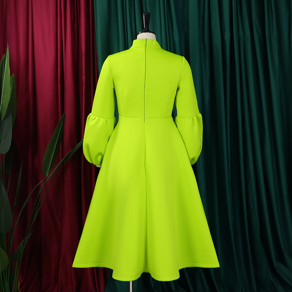 Damklänning med puffärm och rosett i midjan för vår_voghion.com