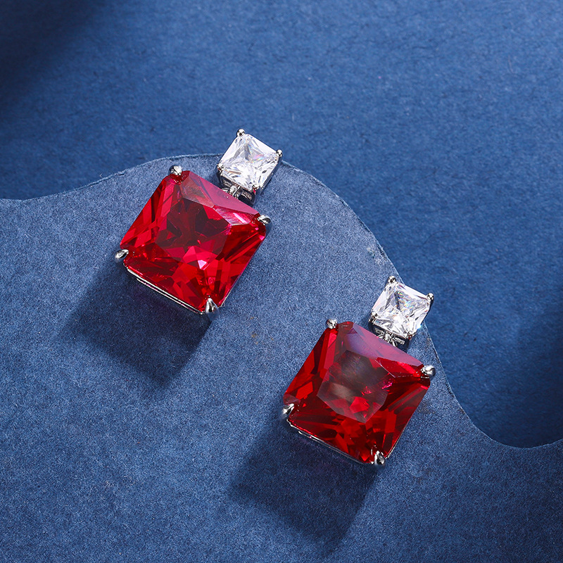 Zhuang Sheng joyería cobre inferior chapado en oro simulación paloma rojo sangre corindón verde nano nicho temperamento traje piedra principal 12*12