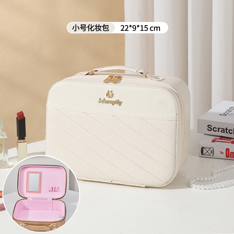 Bolsa de cosméticos de cuero caja de almacenamiento de gran capacidad para mujeres caja de cosméticos Portátil Bolsa de almacenamiento de cosméticos de alta apariencia al por mayor