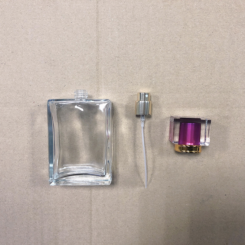 En stock cubierta de acrílico B015-50ML100ml cuadrado transparente vidrio perfume spray sub-embalaje cosmético botella vacía