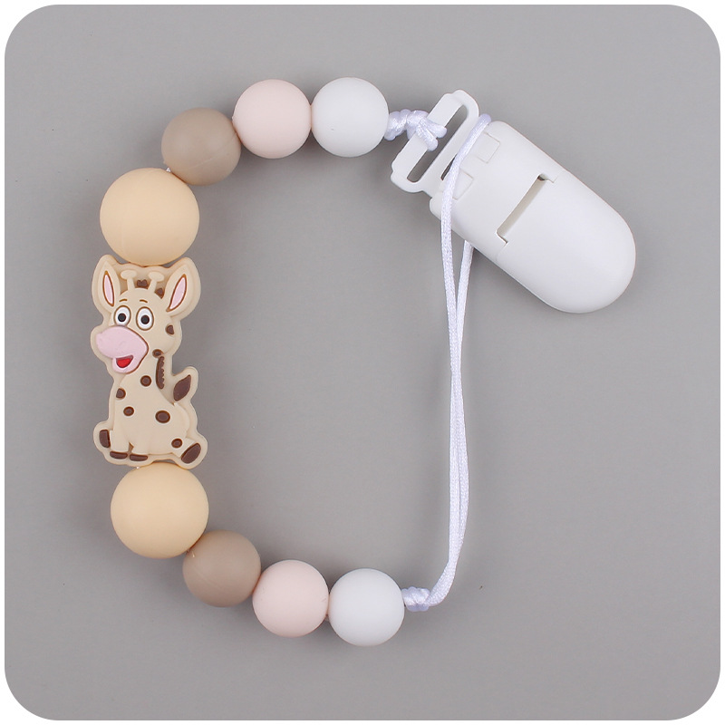 Nuevo bebé suministros chupete cadena creativa de dibujos animados jirafa silicona bebé mordedura cadena anti-caída molar
