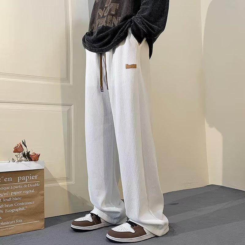 Pantalones de chándal hombres primavera y otoño verano 2023 delgada suelta recta estilo japonés moda drapeado hombres pantalones largos ocasionales