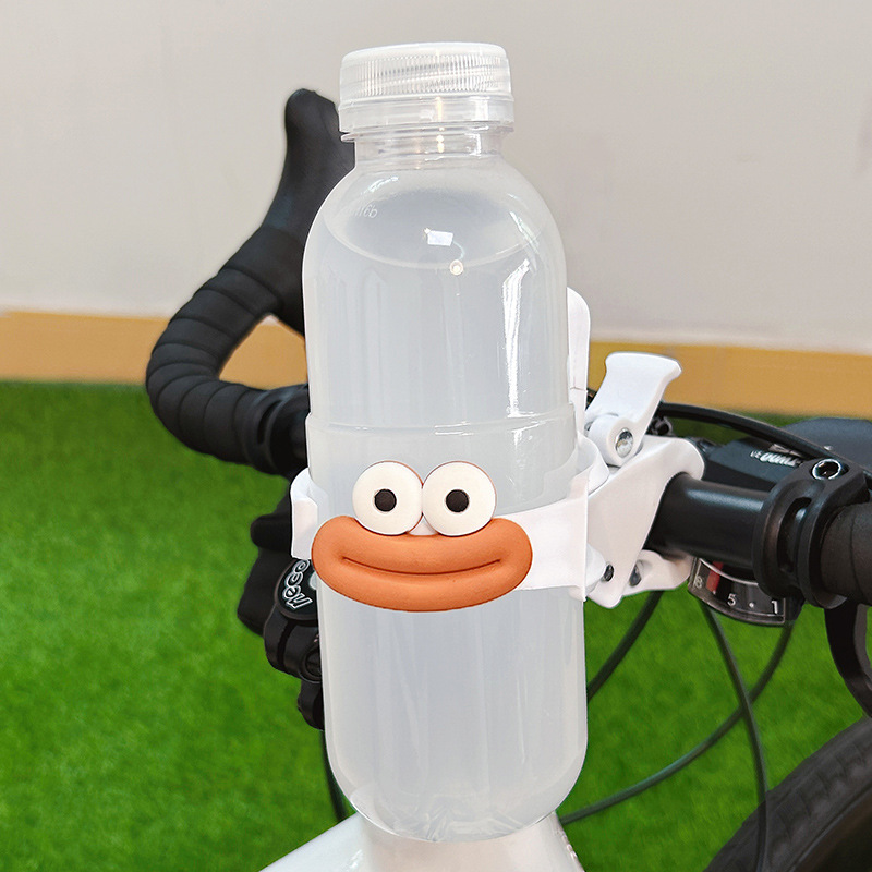 自転車のコップの棚のかわいい漫画のハンドルの多機能のオートバイの電気自動車は通用して飲み物の水筒のブラケットを入れます。|undefined