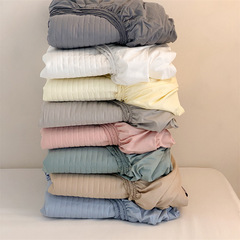純綿のベッドカバーの単品の純綿の防塵カバーを厚くして、綿を挟んで滑り止めをします。