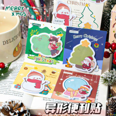 クリスマスの創意的な付箋を貼ります。