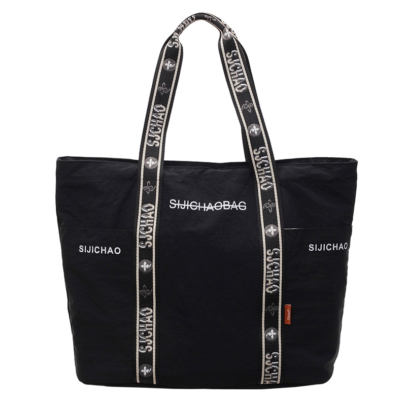 Bolsa de tela de nylon de gran capacidad para mujeres bolsas de impresión de letras de la ciudad simple viaje bolso de hombro bolso de mano ocio