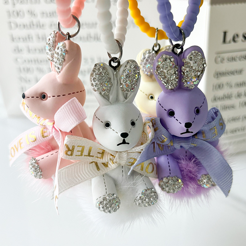 Colgante pequeño conejo llavero de automóvil arco colgante de pelo de visón delicada máquina de garra de dibujos animados pequeño colgante de regalo