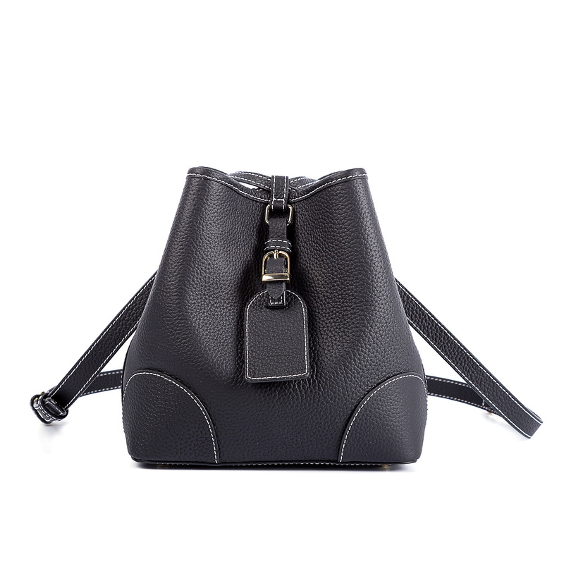 Export Korean Designer Women's Handmade Vintage Cowhide Bucket Bag Cross-border Litchi Pattern Drawstring Commuter Bucket Bag Export Korean Designer Women's Handmade Vintage Cowhide Bucket Bag Cross-border Litchi Pattern Drawstring Commuter Bucket Bag