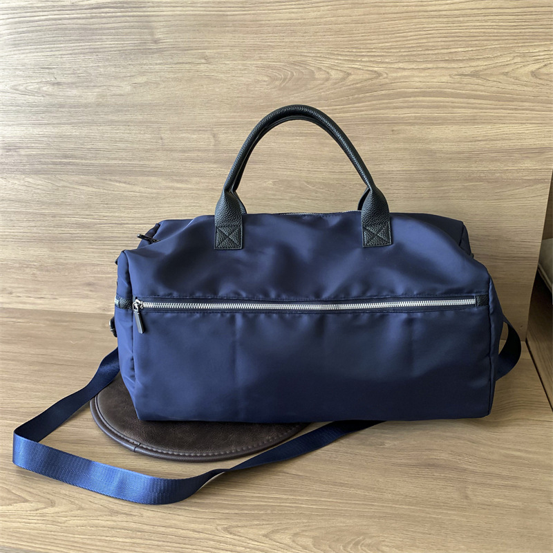 Bolso de viaje ligero de gran capacidad de nailon, bolso de deporte de ocio, bolso de hombro de viaje simple para mujer, bolso al por mayor