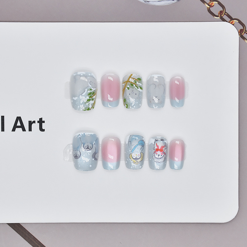 Cartoon para niños que usan uñas de hielo y nieve de verano nuevos productos de cristal ojos de gato hielo azul uñas falsas productos terminados cortos