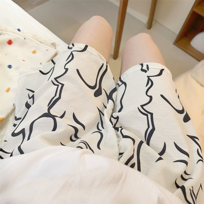 Nuevos pantalones caseros de verano lindos y dulces pantalones cortos casuales delgados de algodón casero de mujeres de tela de dibujos animados comercio exterior al por mayor