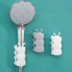 シャワースタンド穴なしシャワー部品固定座吸盤式毛虫シャワースタンドメーカー卸売り