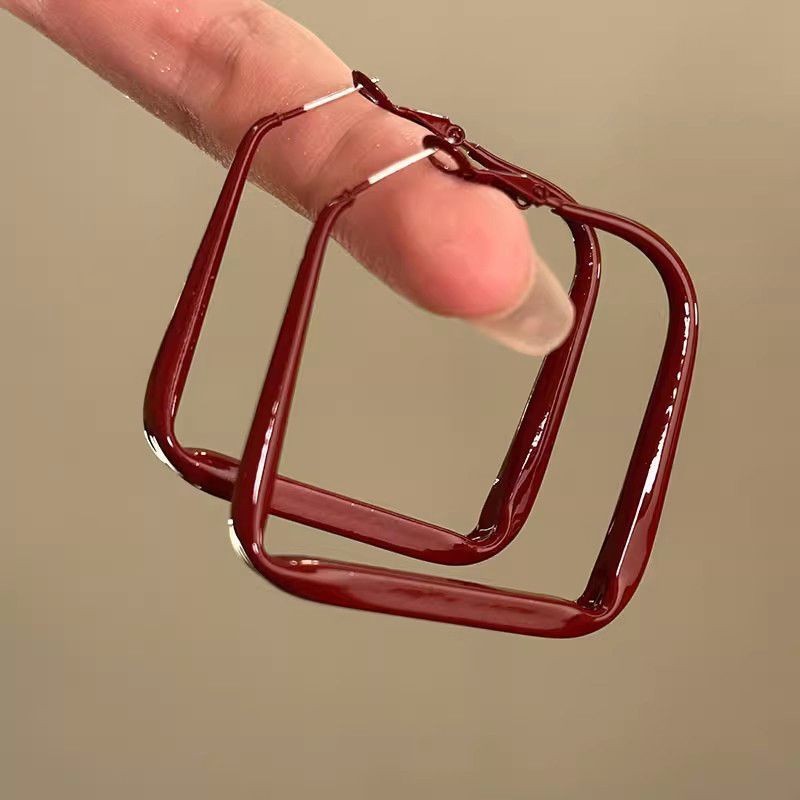 Pendientes de aleación Pendientes de alta calidad de perlas para mujer Pendientes exagerados de temperamento de lujo ligero coreano Pendientes largos con borlas al por mayor