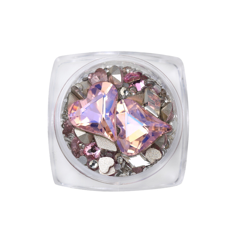 Arte de uñas celebridad en línea corazón torcido gema material paquete nuevo K9 cristal de diamante redondo tamaño especial en forma de diamante decoraciones de uñas al por mayor