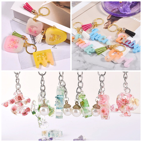 11-piece resin molds featuring English letters and numbers, with holes for pendants, earrings, and other accessories, made of silicone