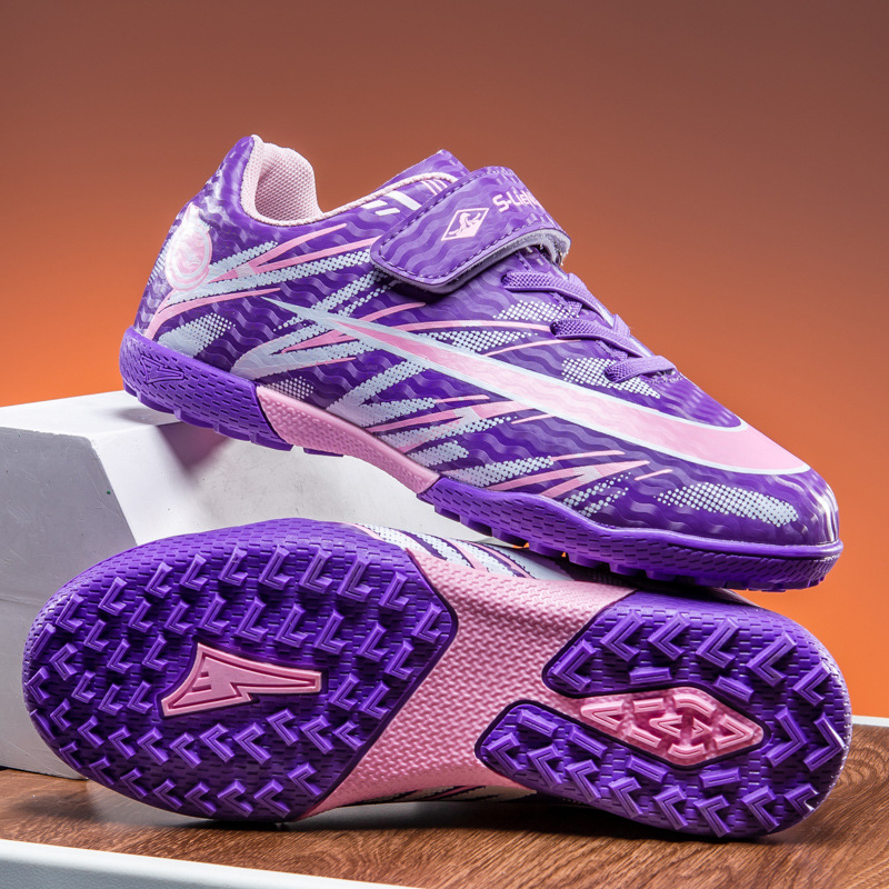 Zapatos de fútbol transfronterizos de alto perfil para hombres TF zapatos de entrenamiento antideslizante transpirables para niños zapatos deportivos profesionales para estudiantes