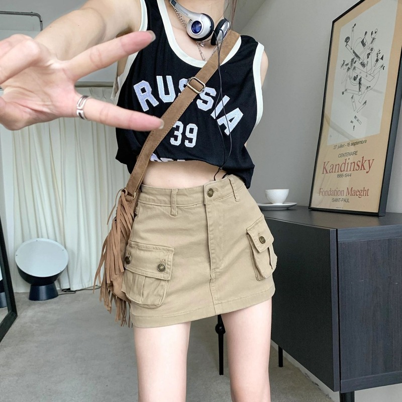カーキ色の工装スカートの女性の秋のギャルのデニムはやせているアメリカ風の半身のスカートの高腰の韓国版のa字のショートスカートを現します。|undefined