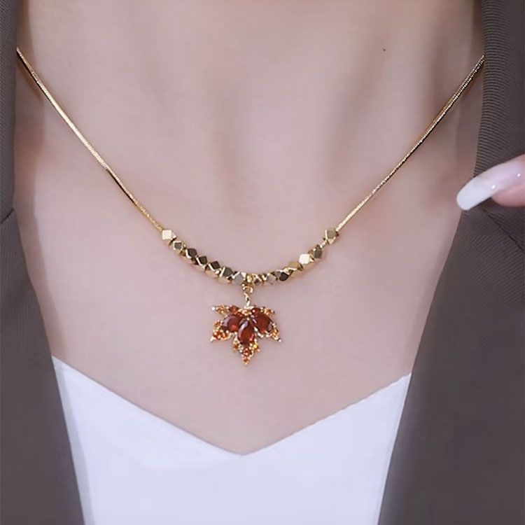 Elegant Maple Leaf Alloy Titanium Steel Inlay Zircon Women's Rings Necklace display picture 2