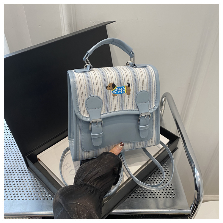 The new backpack for the autumn of 2024 is a fashionable and simple hand-held student single-shoulder bag with a checkered lid and a retro crossbody style undefined