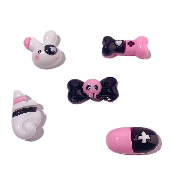 Caricatura dulce serie cool cráneo arco accesorios de resina DIY pegamento crema caja de teléfono móvil adornamiento de cabello agujero botón de zapato